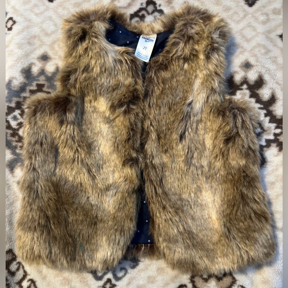 Cute faux fur vest. These sell out fast every time I would try to get one.